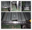 Macchina per la produzione di lamiere di rivestimento per pavimenti in acciaio metallico